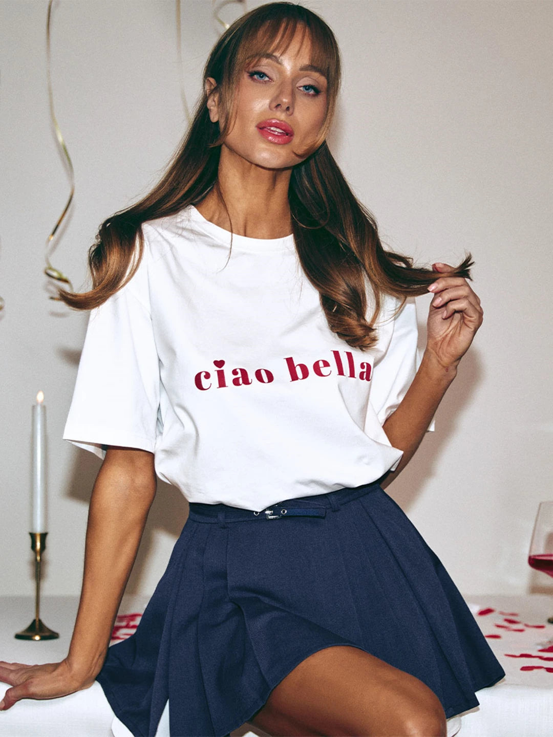 Side view of white Ciao Bella oversized cotton t-shirt for women