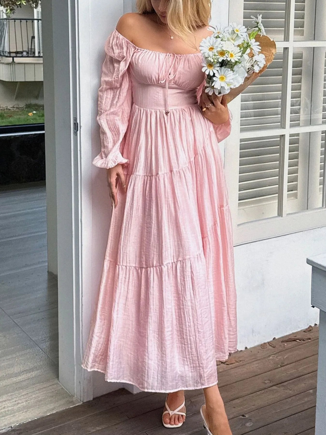 Front view of tiered balloon sleeve midi dress with ruched detail