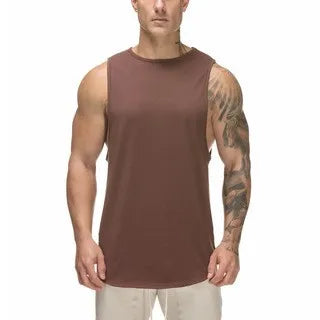 Model wearing plus size round neck tank top styled casually