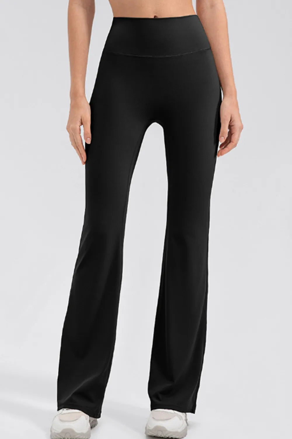 Front view of high-waisted bootcut active leggings with a wide waistband