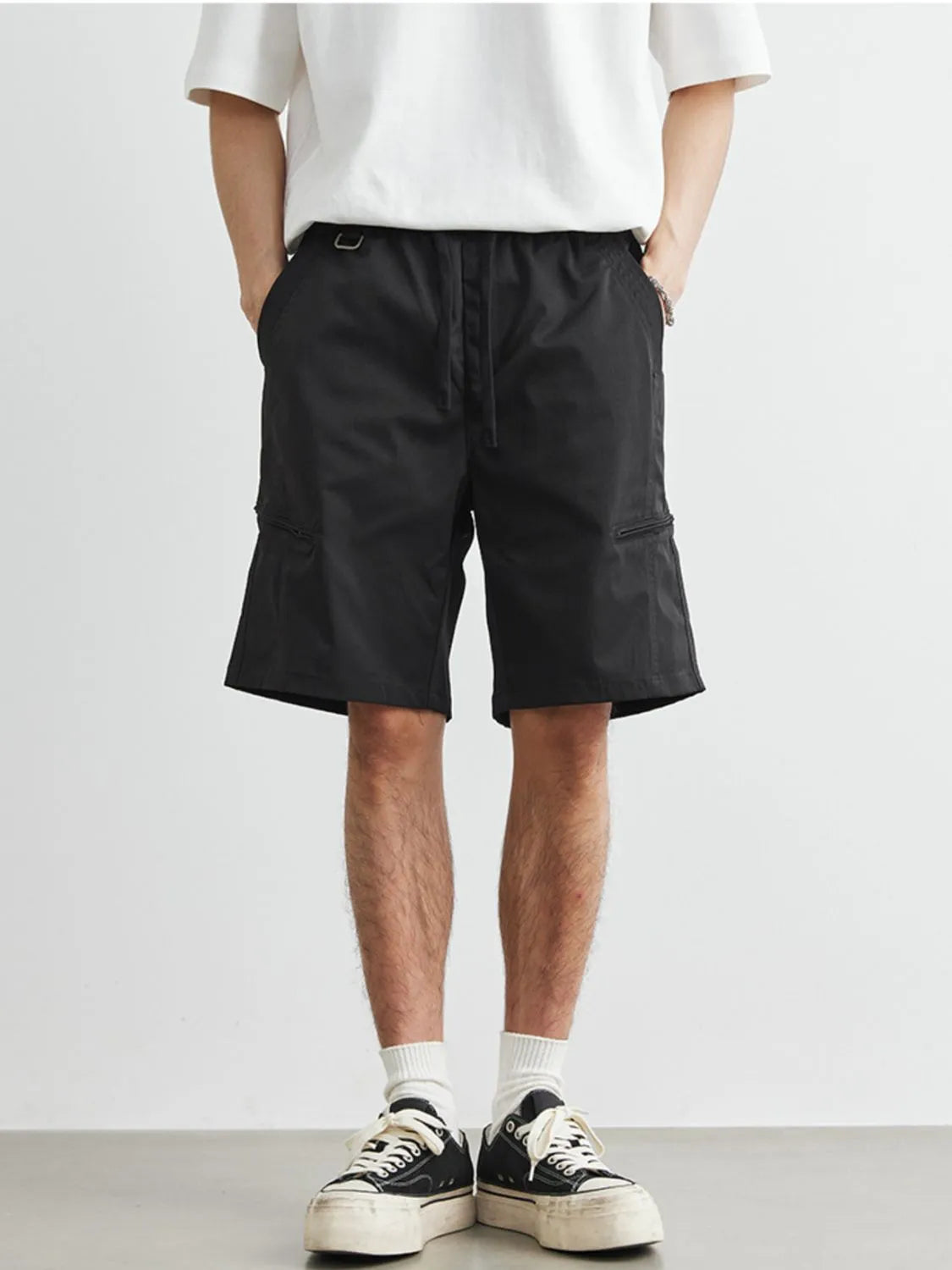 Close-up of cargo pocket detail on drawstring shorts