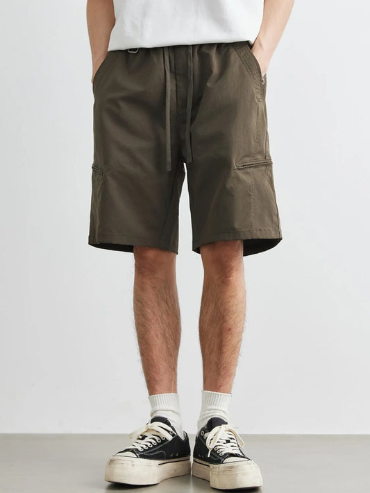 Front view of drawstring pocketed cargo casual shorts
