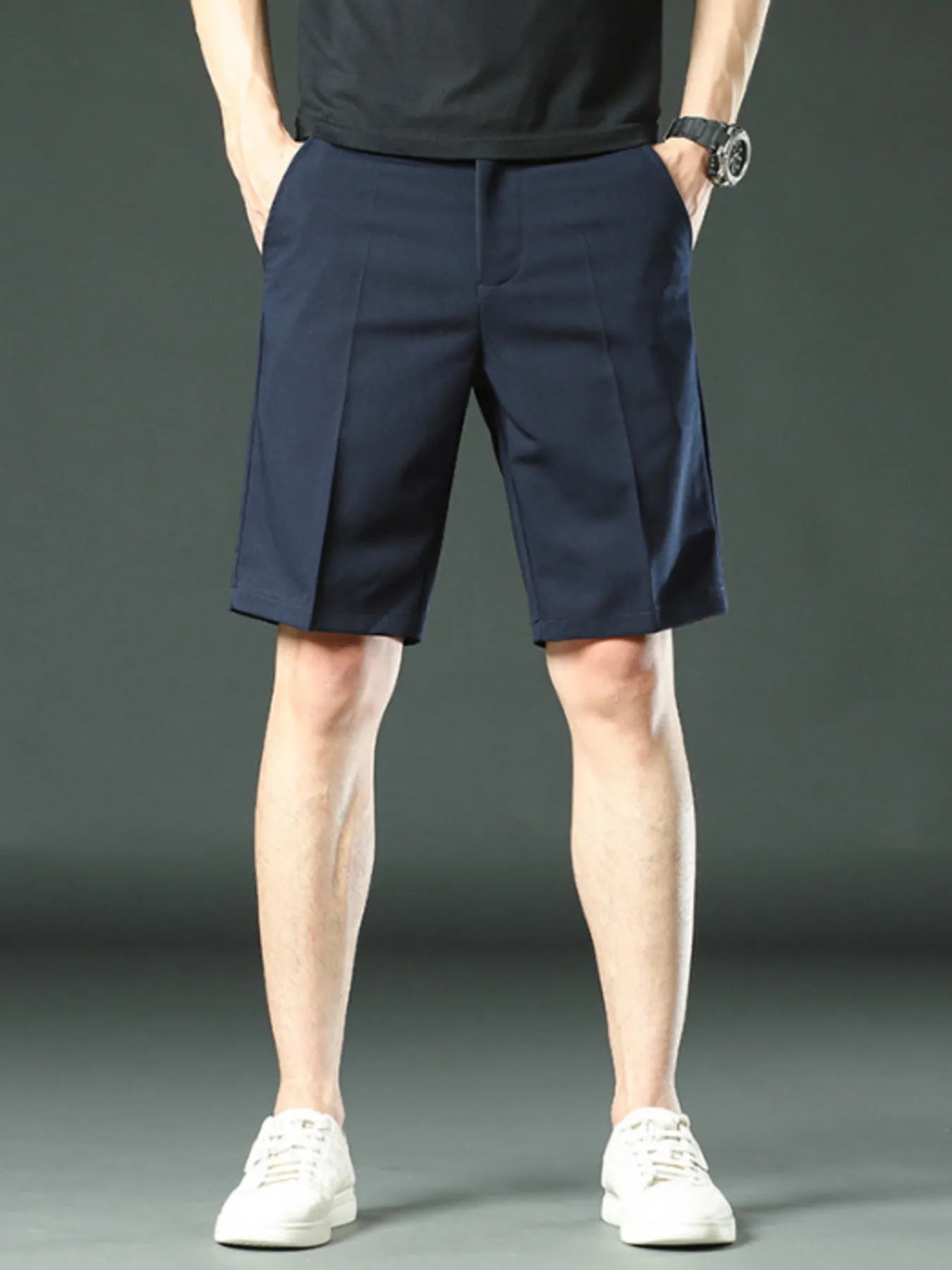 Close-up of pocket detail on cotton blend shorts