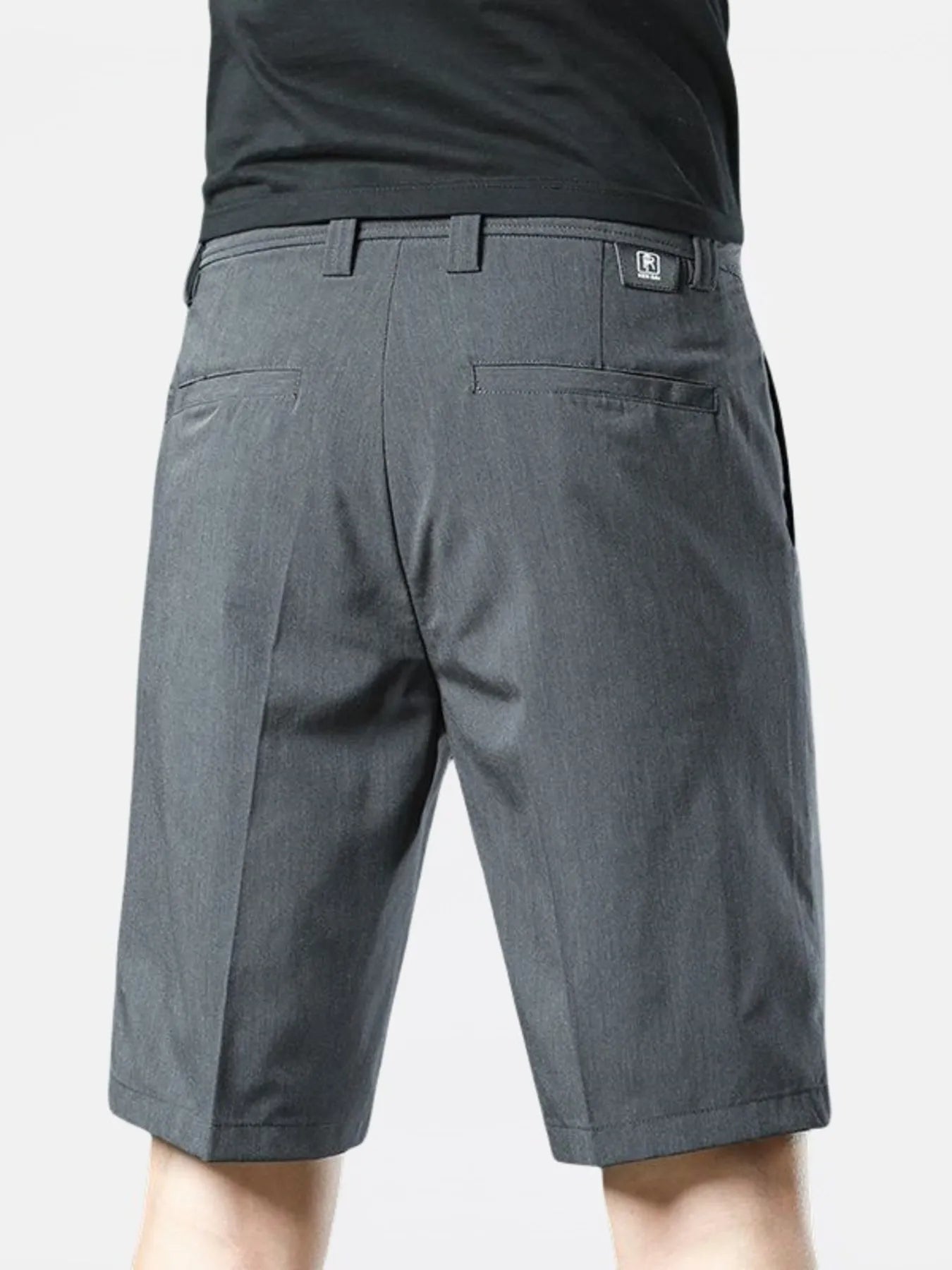 Model wearing loose fit cotton blend shorts styled casually