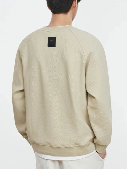 Back view of crew neck sweatshirt with contrast detail