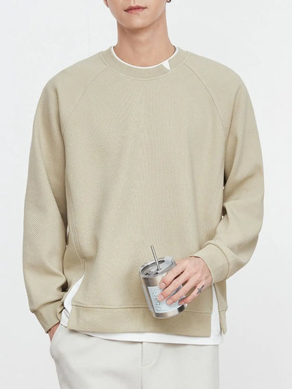 Model wearing contrast crew neck sweatshirt styled casually