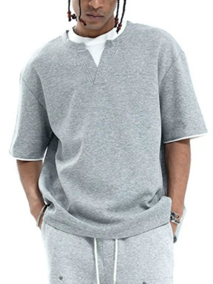 Model wearing contrast trim short sleeve T-shirt styled casually