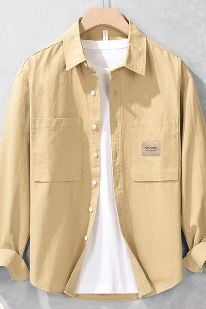 Model wearing everyday cotton blend button-up long sleeve shirt styled casually