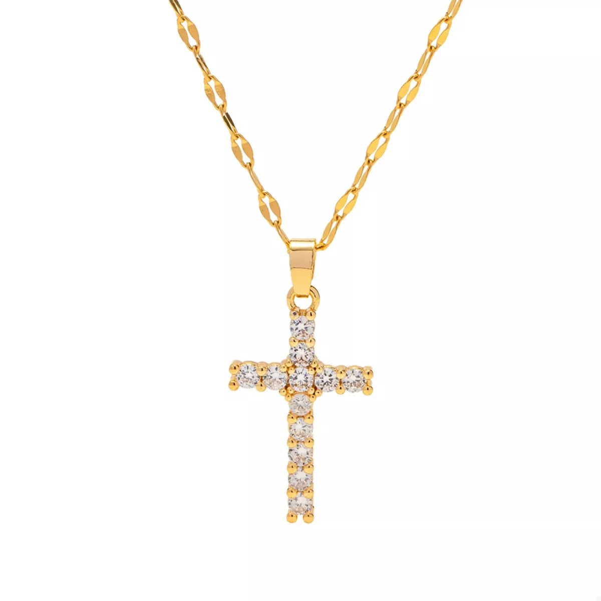 Close up of zircon detail on gold cross pendant necklace