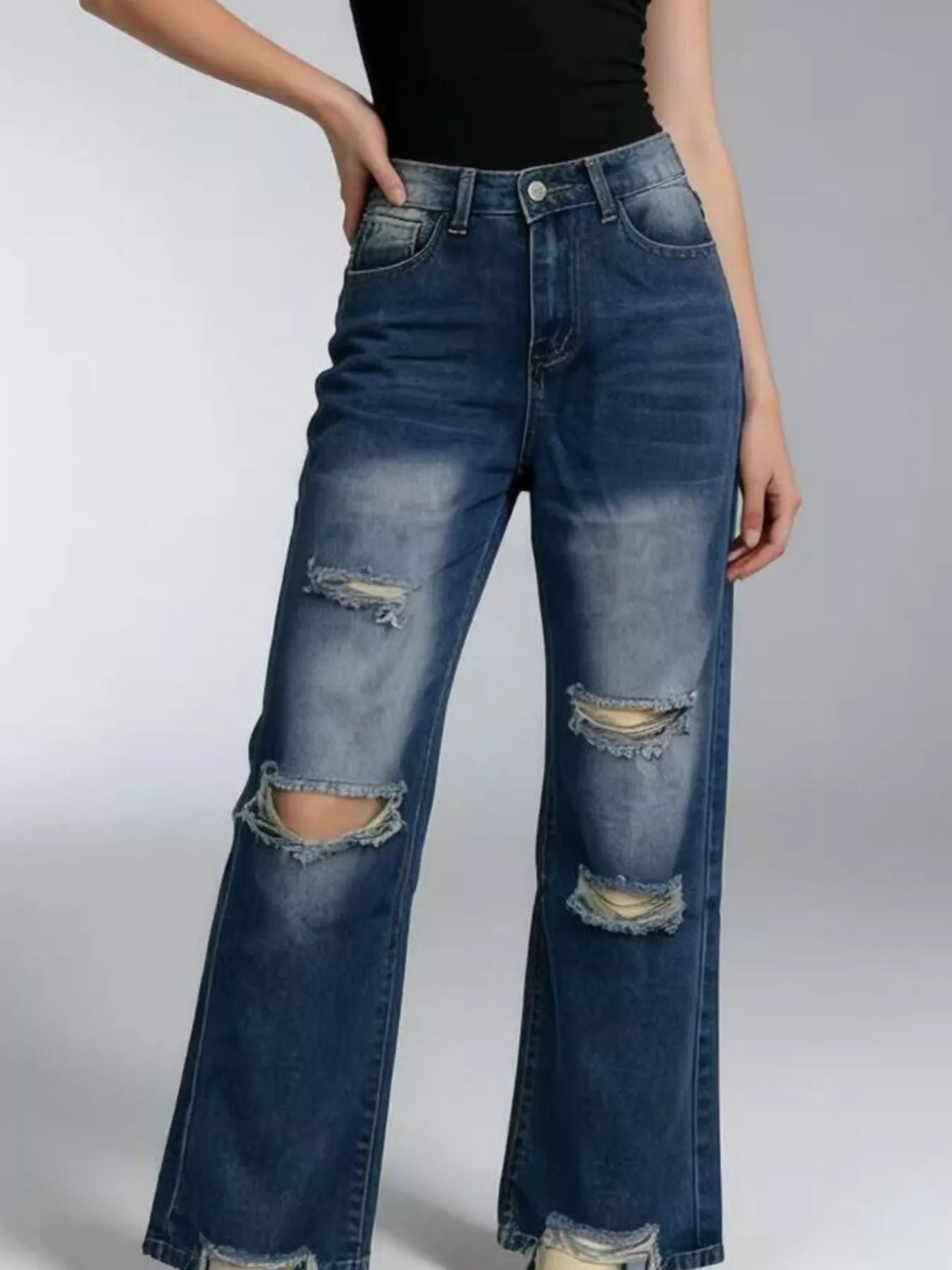 Close-up of the artisanal distressing and high-quality denim fabric
