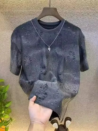 Close-up of distressed texture on cotton short sleeve T-shirt