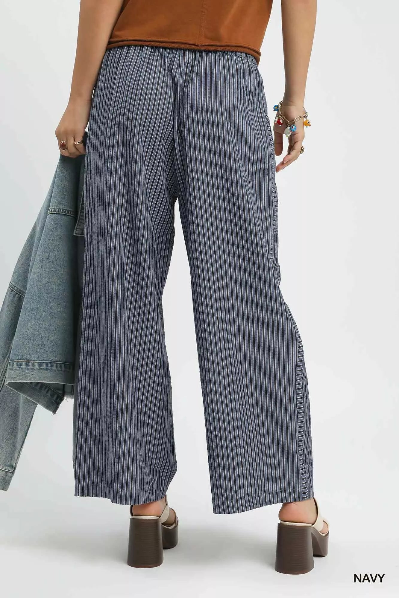 Close-up of the adjustable drawstring waistband and pocket construction