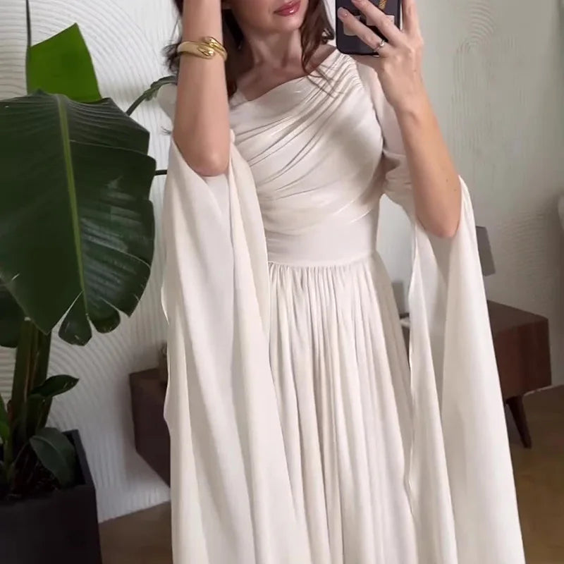 Model wearing the high-waist slim gown styled for a refined evening event