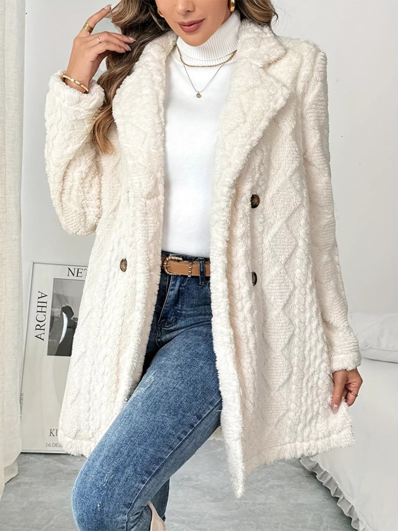 Model wearing the longline fleece coat