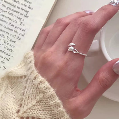 Close-up of the delicate flower engraving and the high-luster platinum-plated finish
