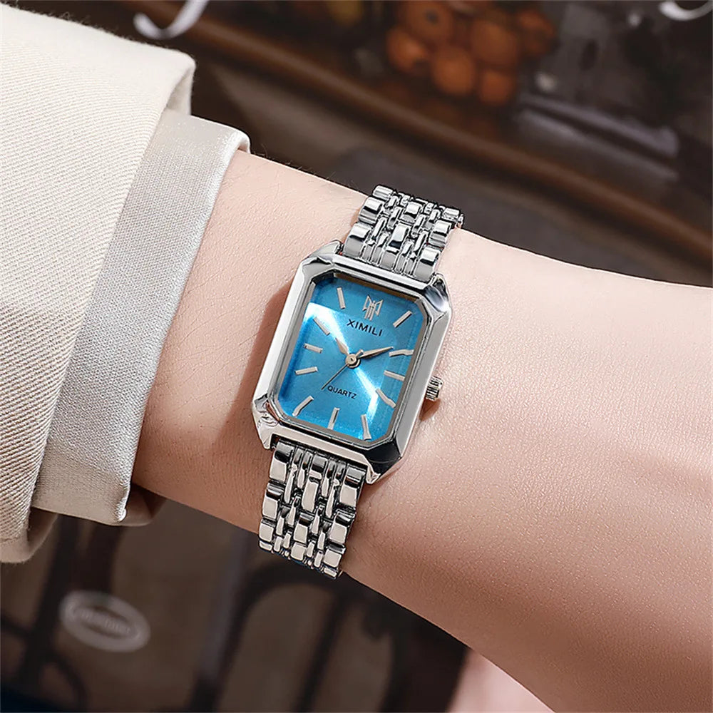 Close-up of the polished stainless steel band and the secure folding buckle closure