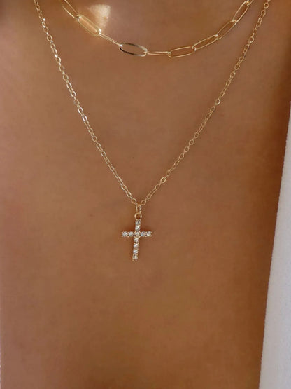 Front view of the 18K gold-plated double-layered necklace with zircon cross pendant