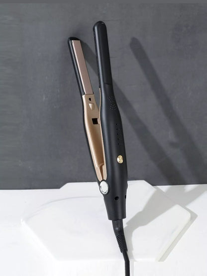 Close up of hair straightener showing temperature control