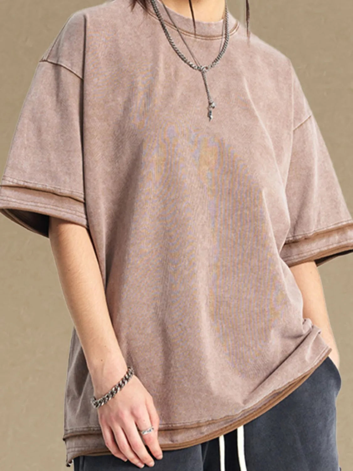 Model wearing everyday cotton half sleeve round neck T-shirt styled casually
