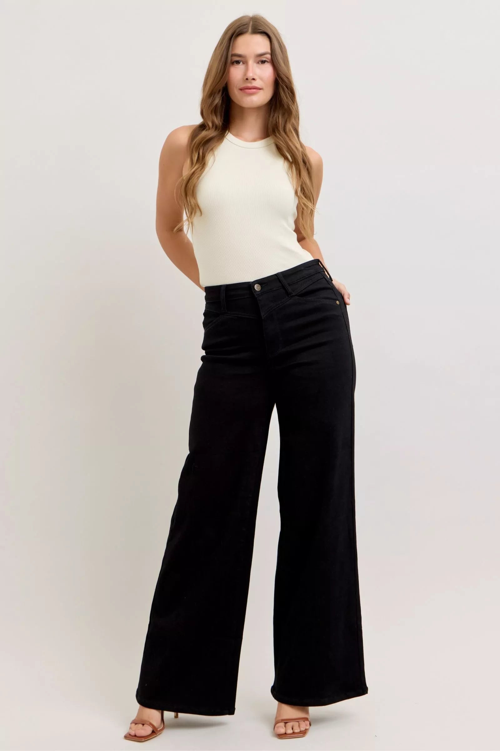 Front view of high-waisted wide leg jeans in a classic wash