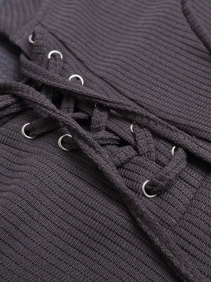 Close-up of lace-up neckline and ribbed texture on short sleeve T-shirt