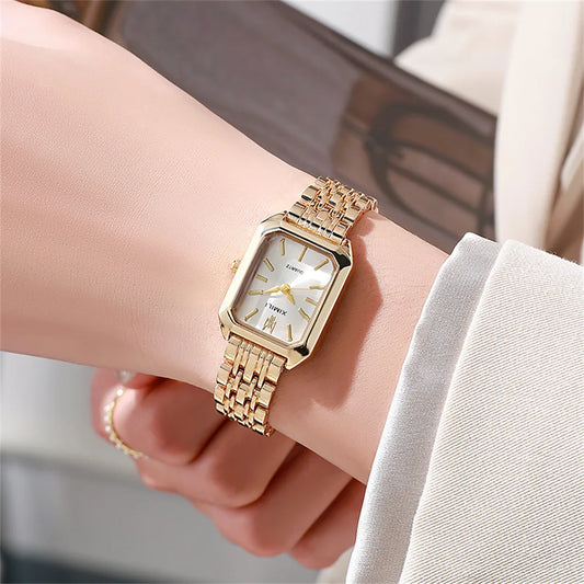 Model wearing the square Roman watch styled with an executive suit for a high-profile business summit