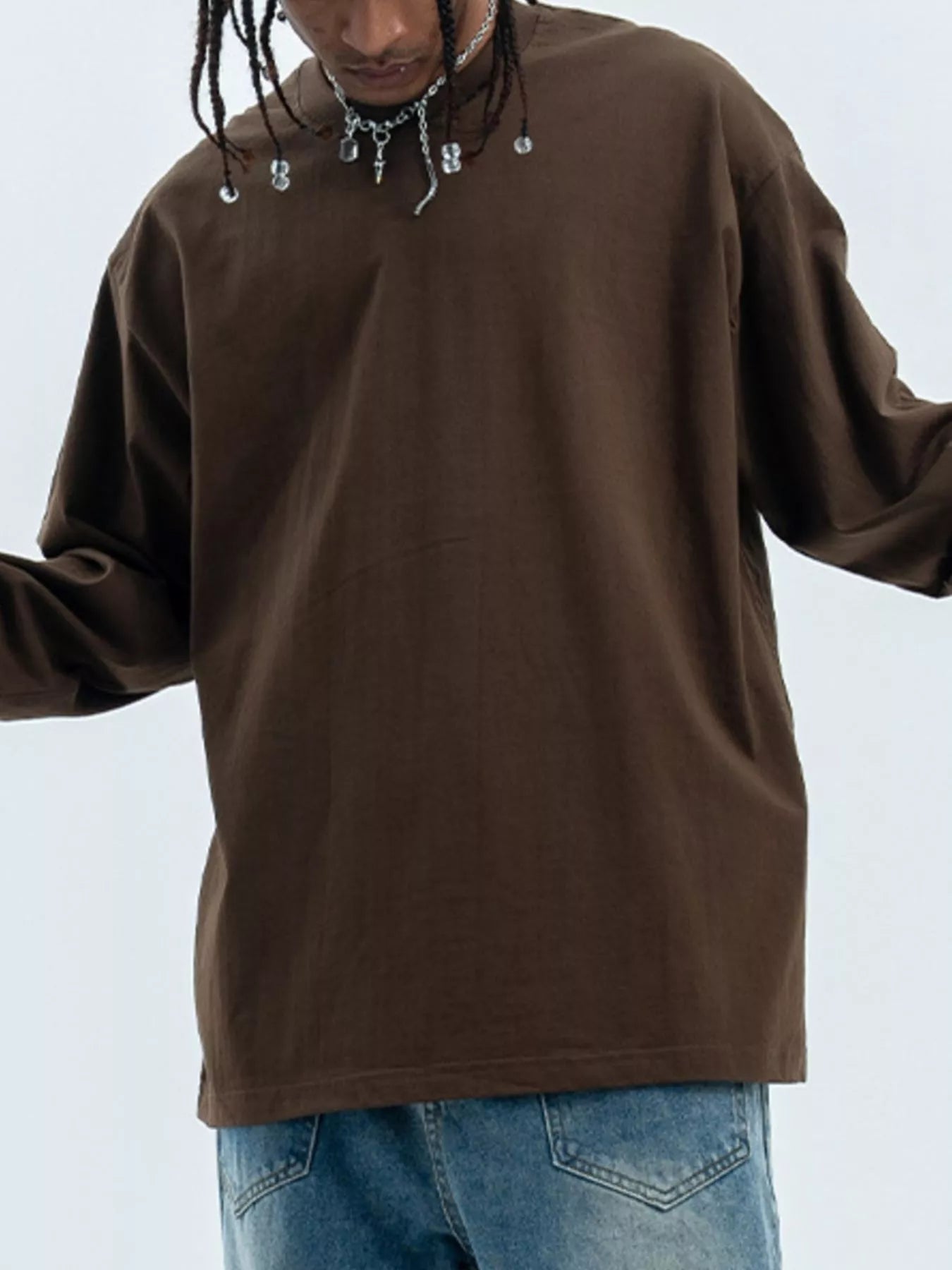 Model wearing essential cotton long sleeve round neck T-shirt styled casually