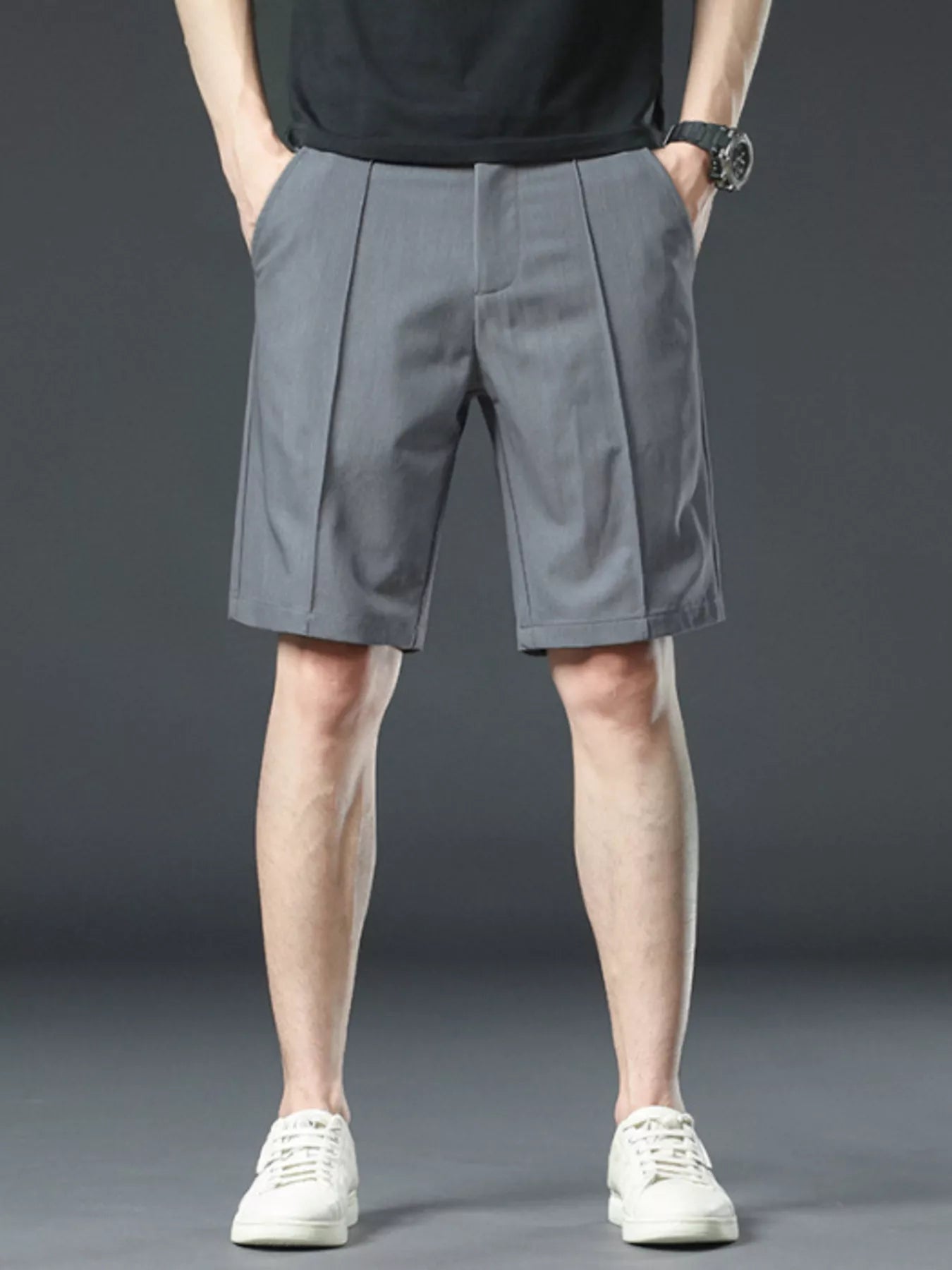 Close-up of pocket detail on relaxed fit shorts