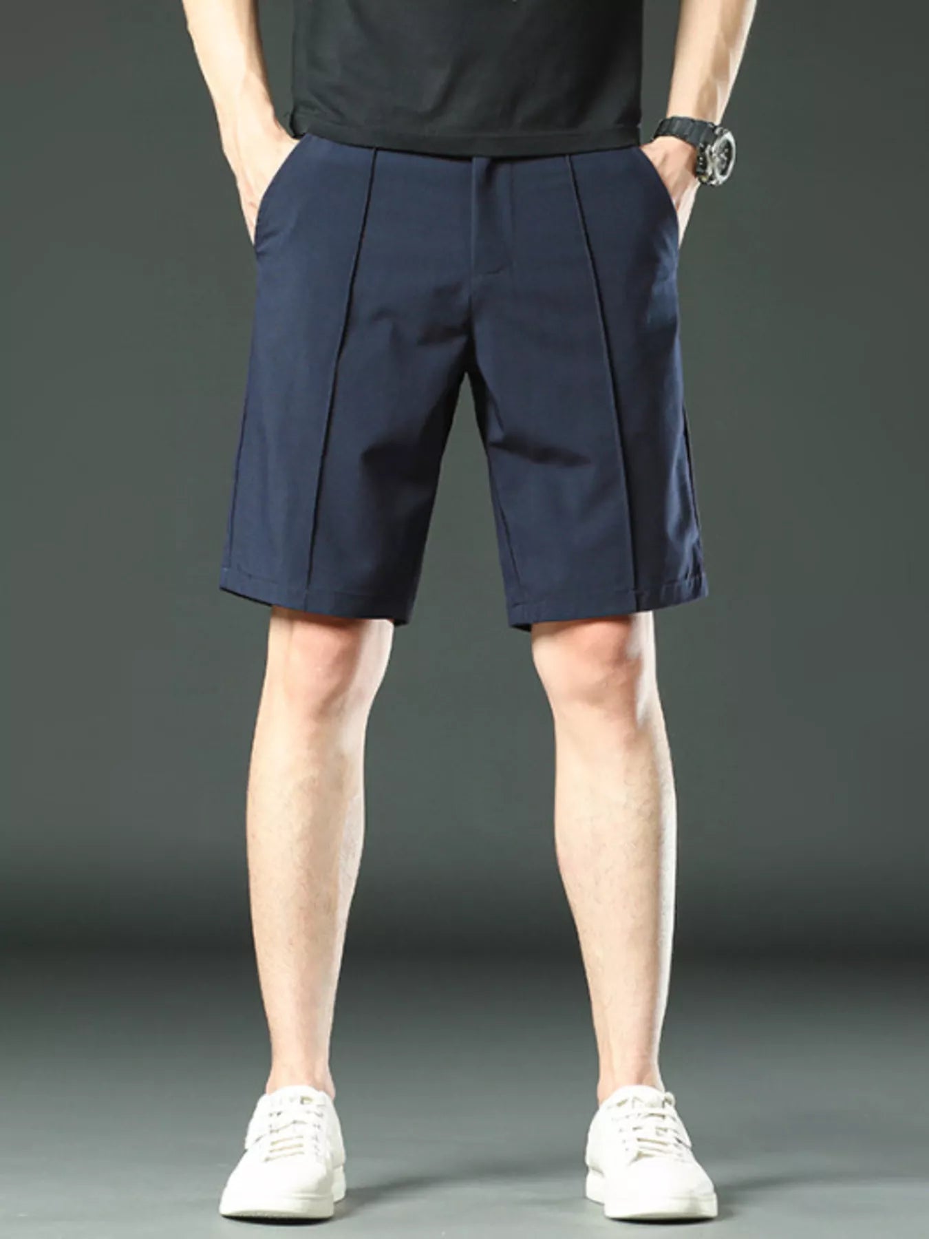 Model wearing loose fit cotton blend shorts styled casually