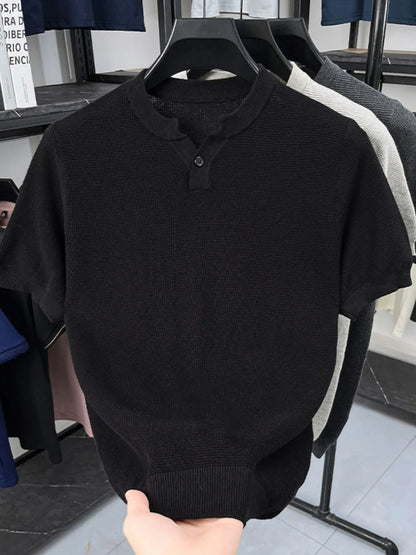 Close-up of ribbed texture and buttoned notched neckline on T-shirt
