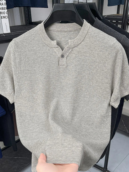 Front view of ribbed notched collar button short sleeve T-shirt