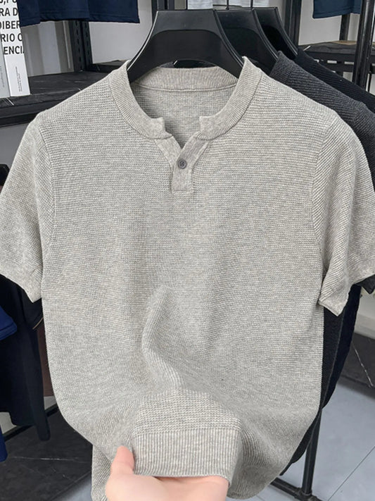 Front view of ribbed notched collar button short sleeve T-shirt