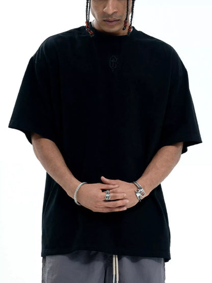Model wearing oversized cotton round neck half sleeve T-shirt styled casually