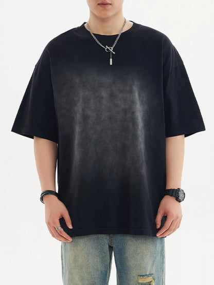 Model wearing oversized cotton half sleeve round neck T-shirt styled casually