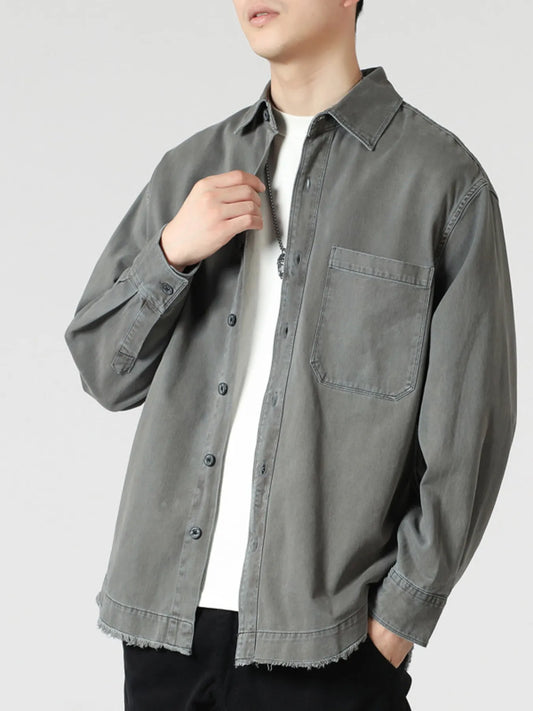 Front view of relaxed oversized button-up long sleeve shirt
