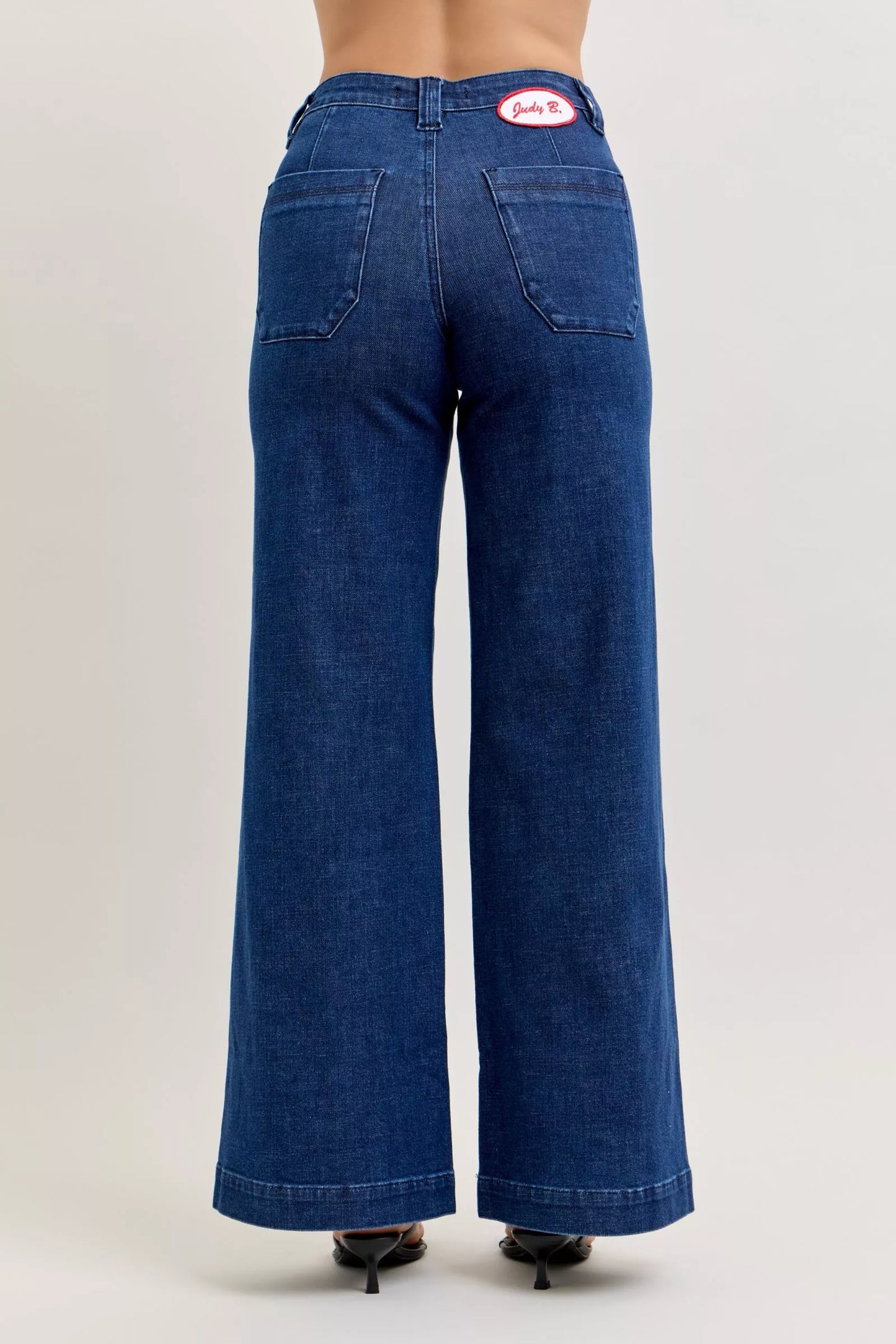 Close-up of the front patch pocket and architectural twisted seam detailing