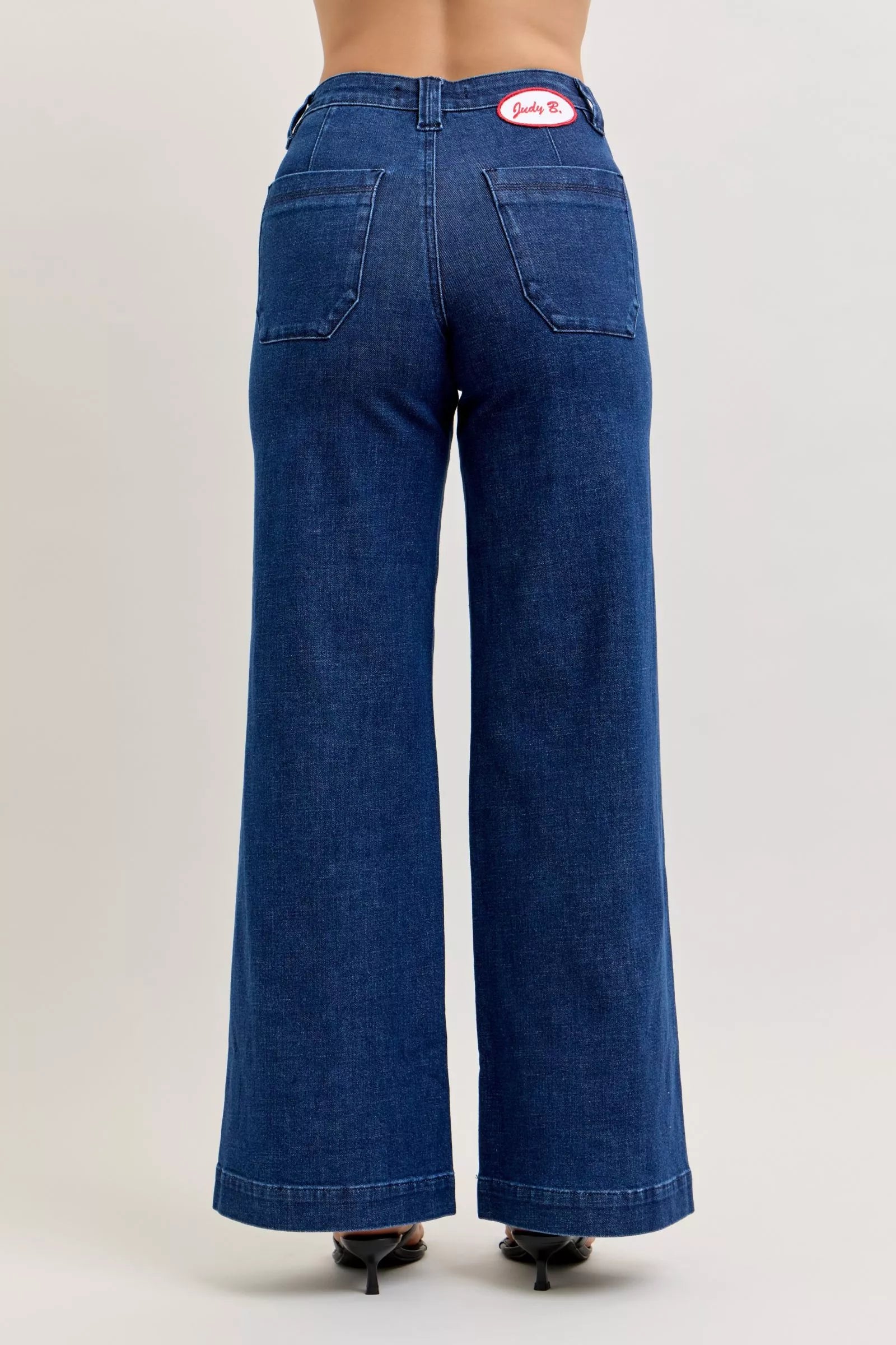 Close-up of the front patch pocket and architectural twisted seam detailing