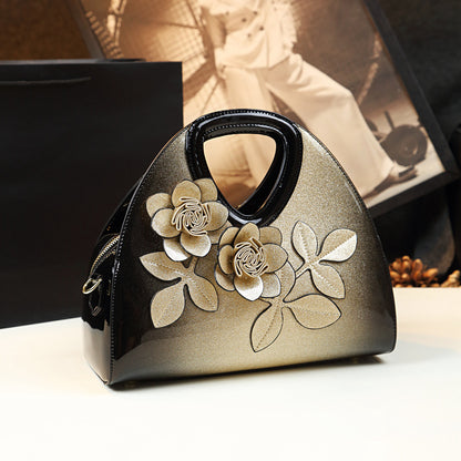 Model carrying the patent flower messenger bag styled for a high-profile business commute