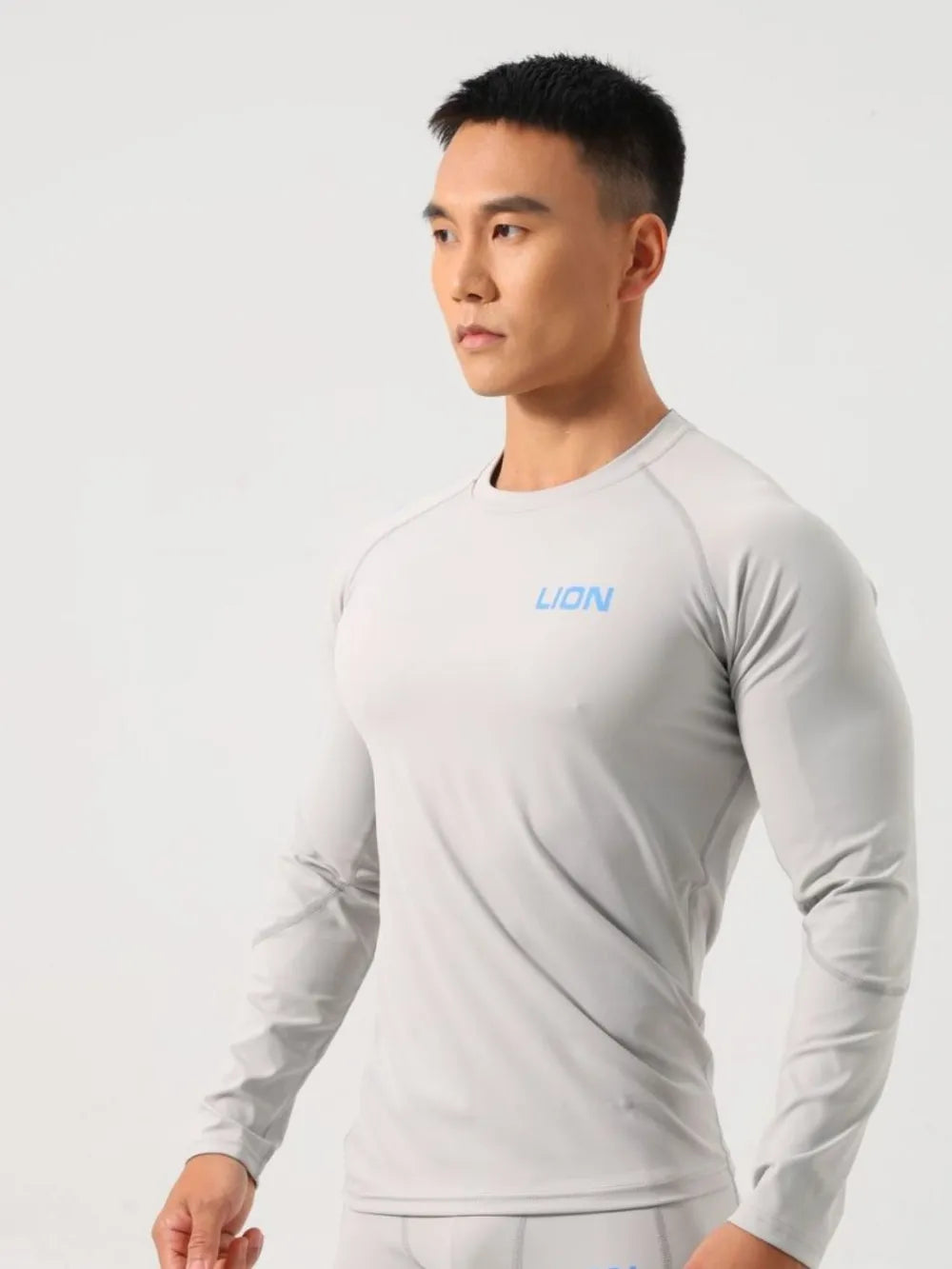 Model wearing stretch performance long sleeve T-shirt styled casually