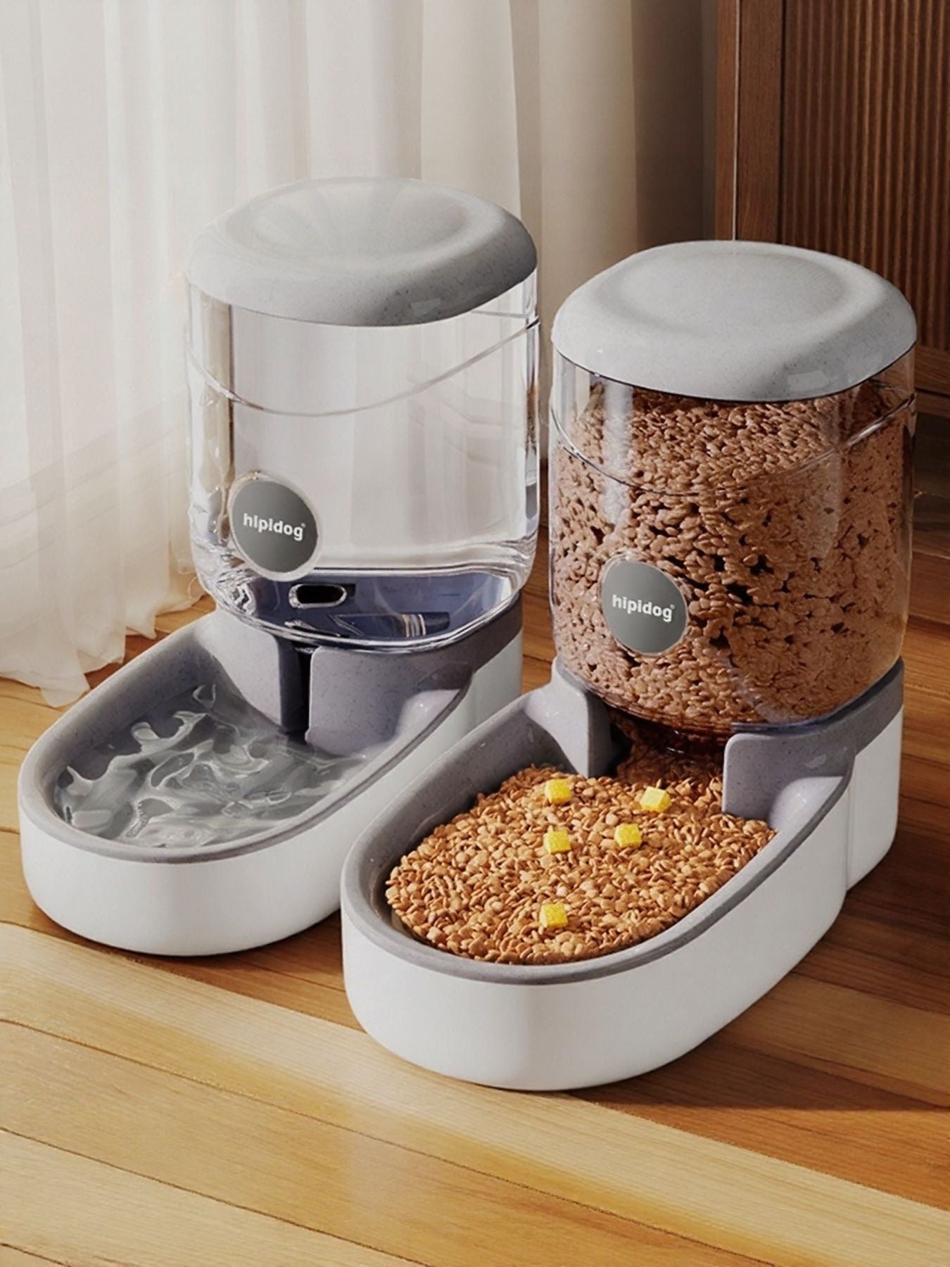 Cat using automatic pet food and water dispenser set