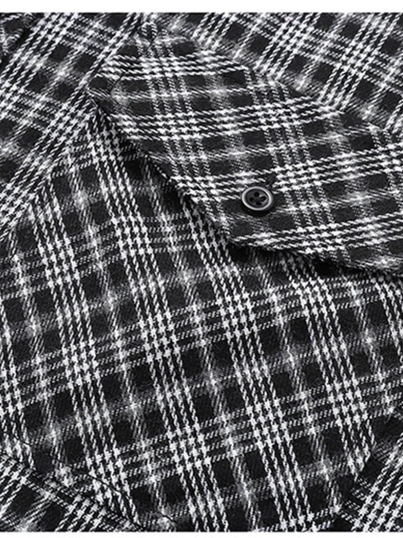 Close-up of plaid pattern and chest pocket on long sleeve shirt