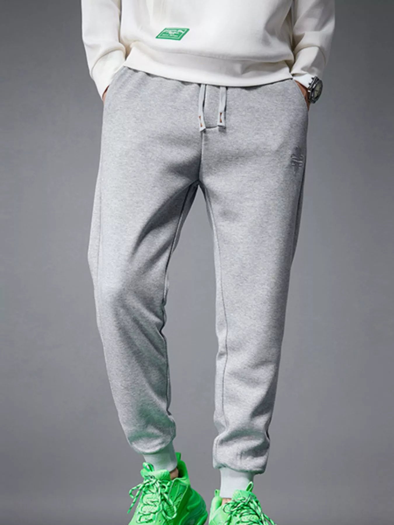 Model wearing drawstring joggers with pockets styled casually