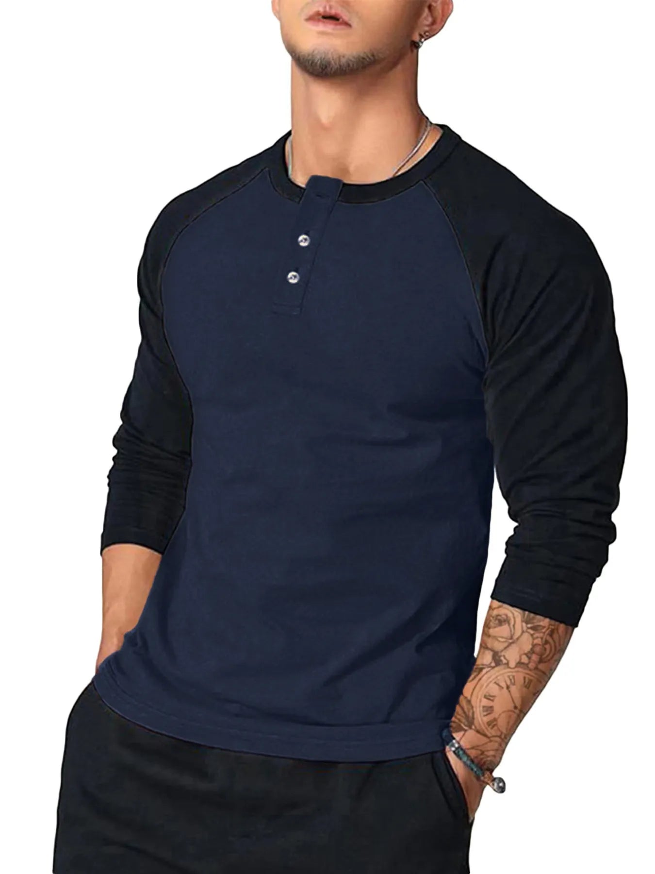 Model wearing raglan contrast stitch button round neck T-shirt styled casually