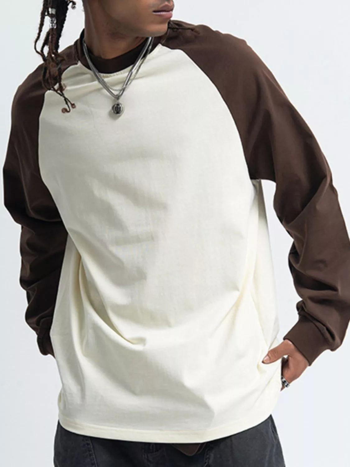 Close-up of raglan sleeve stitching on long sleeve T-shirt
