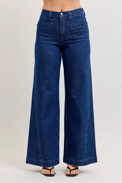 Front view of high-waisted retro wide jeans with patch pockets and twisted seams