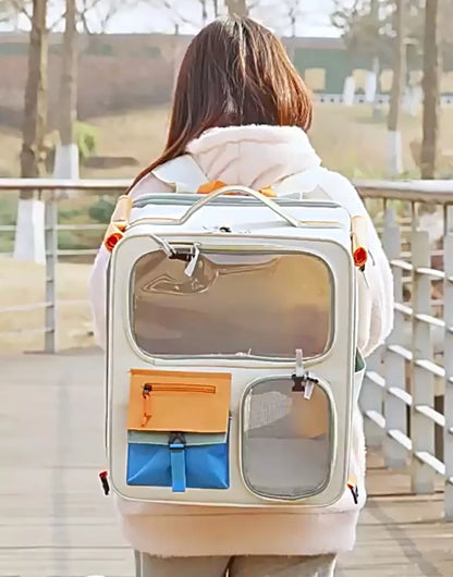 Person pulling rolling pet carrier with telescopic handle