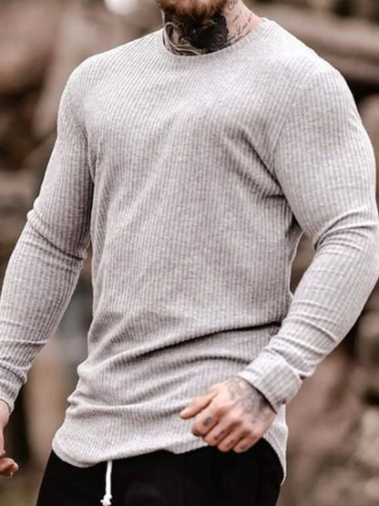 Model wearing classic round neck long sleeve T-shirt styled casually