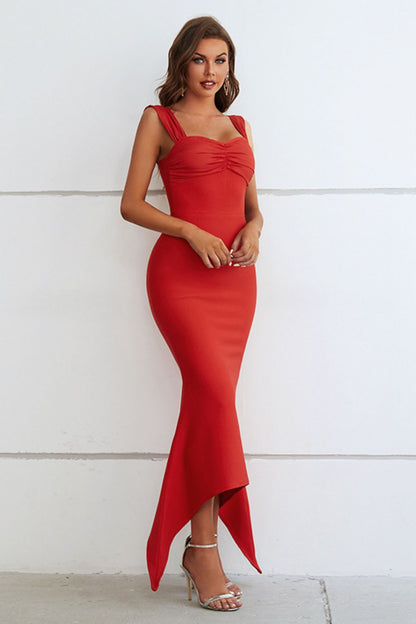 Close-up of ruched detailing and sweetheart neckline on dress