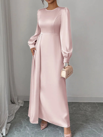 Close-up of satin fabric and slit detail on maxi dress