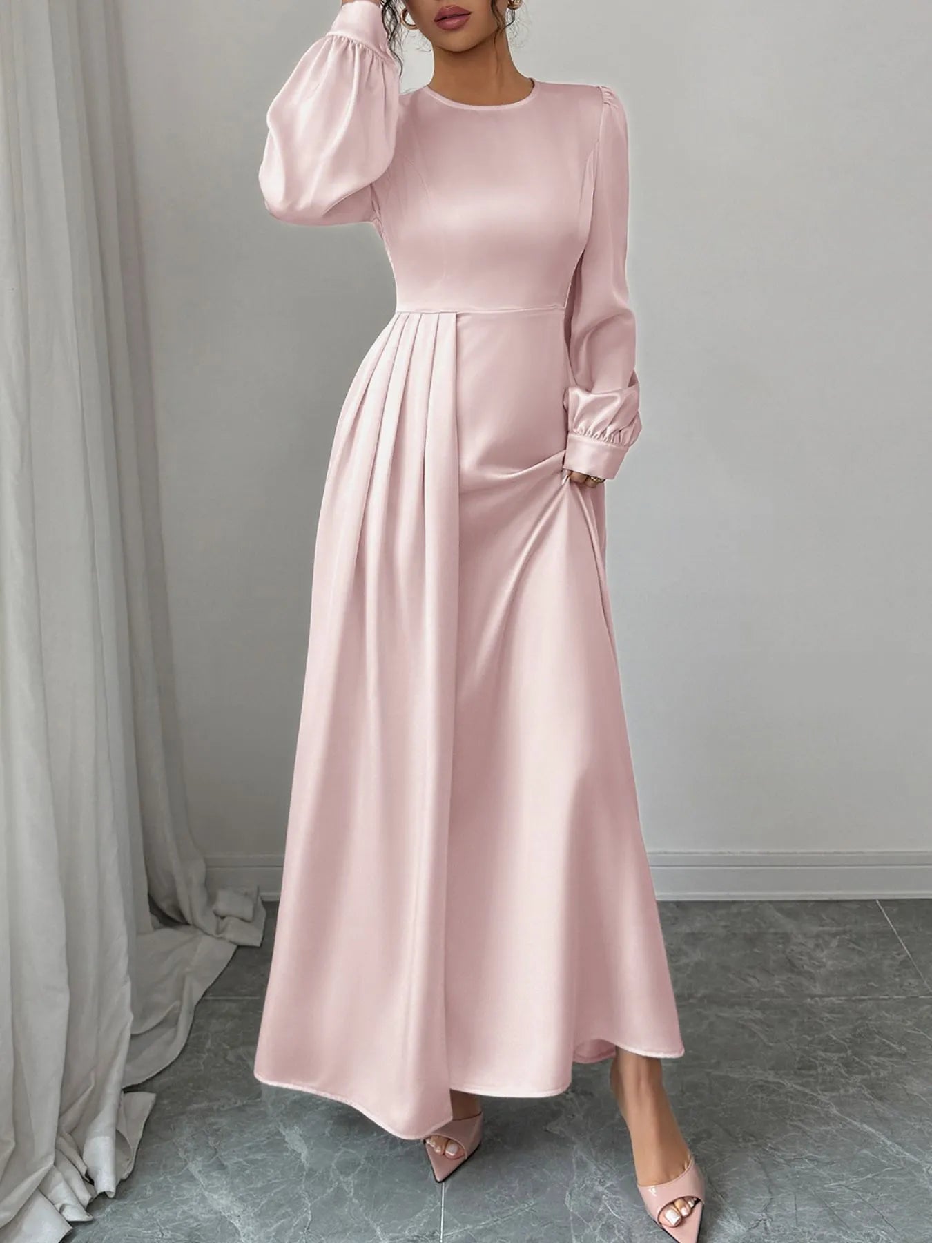 Front view of satin long sleeve maxi dress with slit